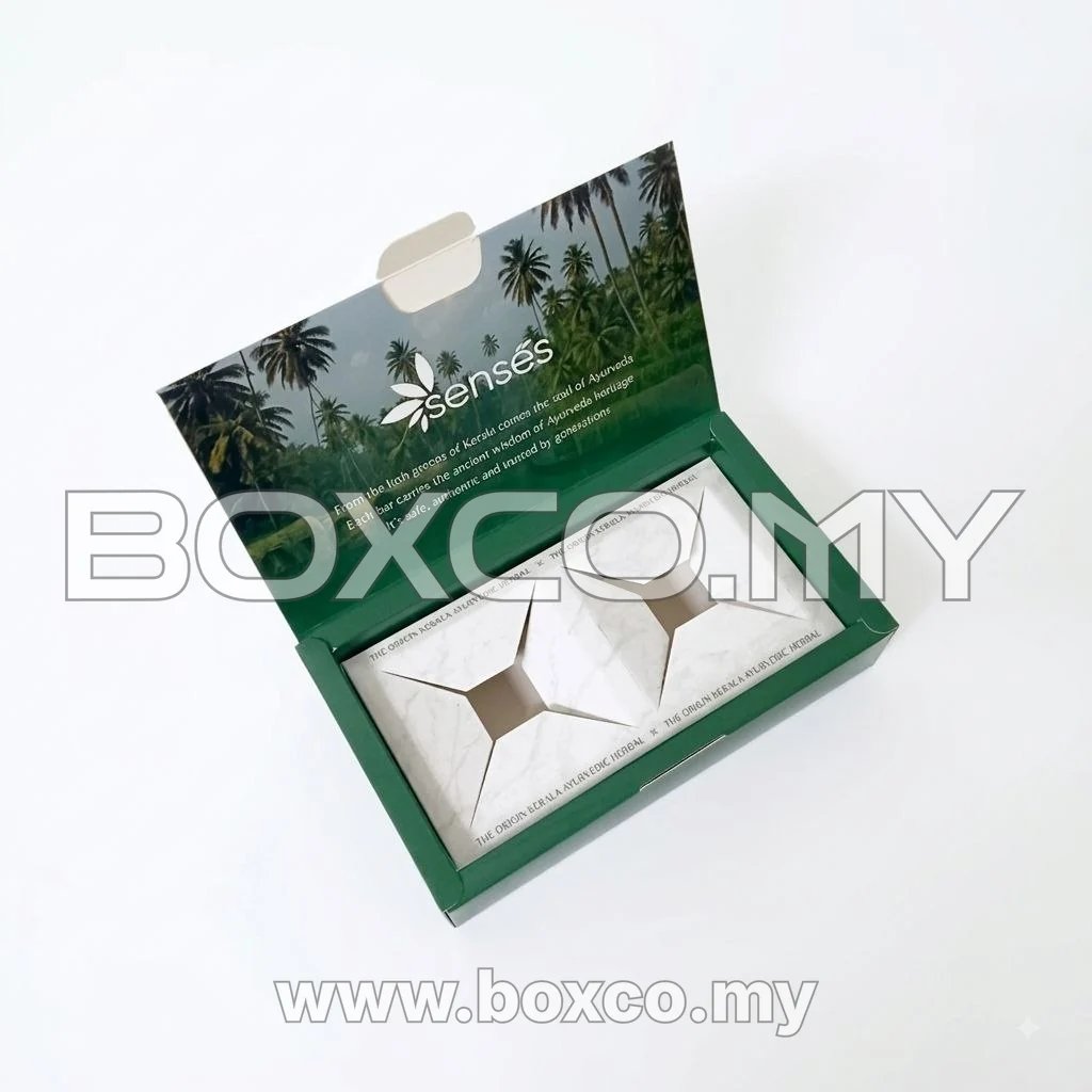 Open green Calm Soap box with tropical lid artwork and two fitted bar compartments